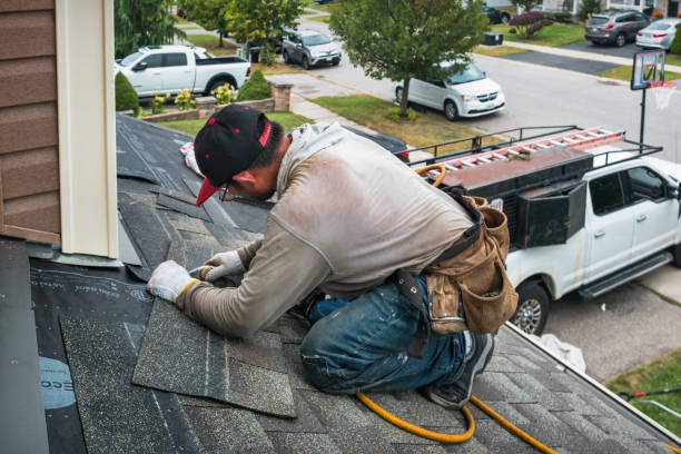 Professional Emergency Roof Repair technician working in New Philadelphia, OH